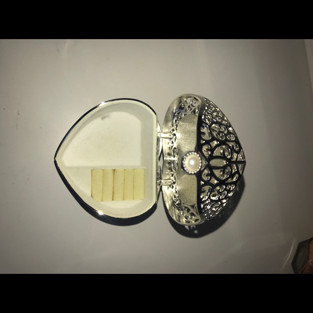 Brand new silver heart jewelry box.